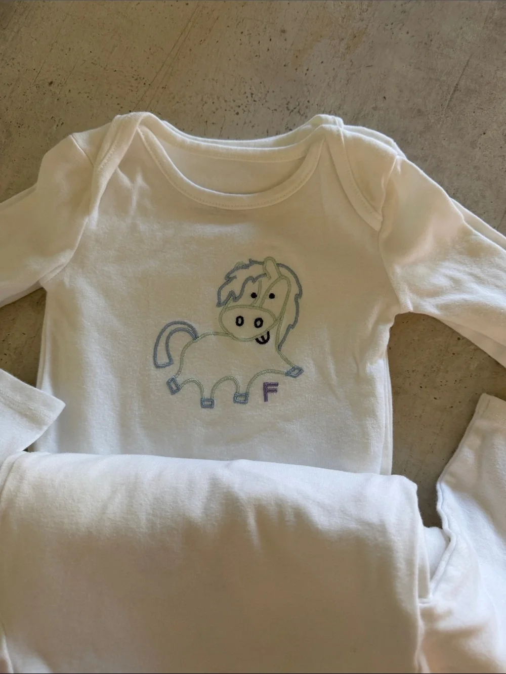 White Long-Sleeve Baby Bodysuit with horse motif ( days of week, complete set)